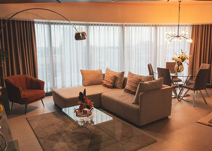 A condominium living room with a couch and a coffee table.